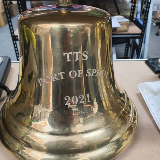 Engraving on Bell - Trophy Land